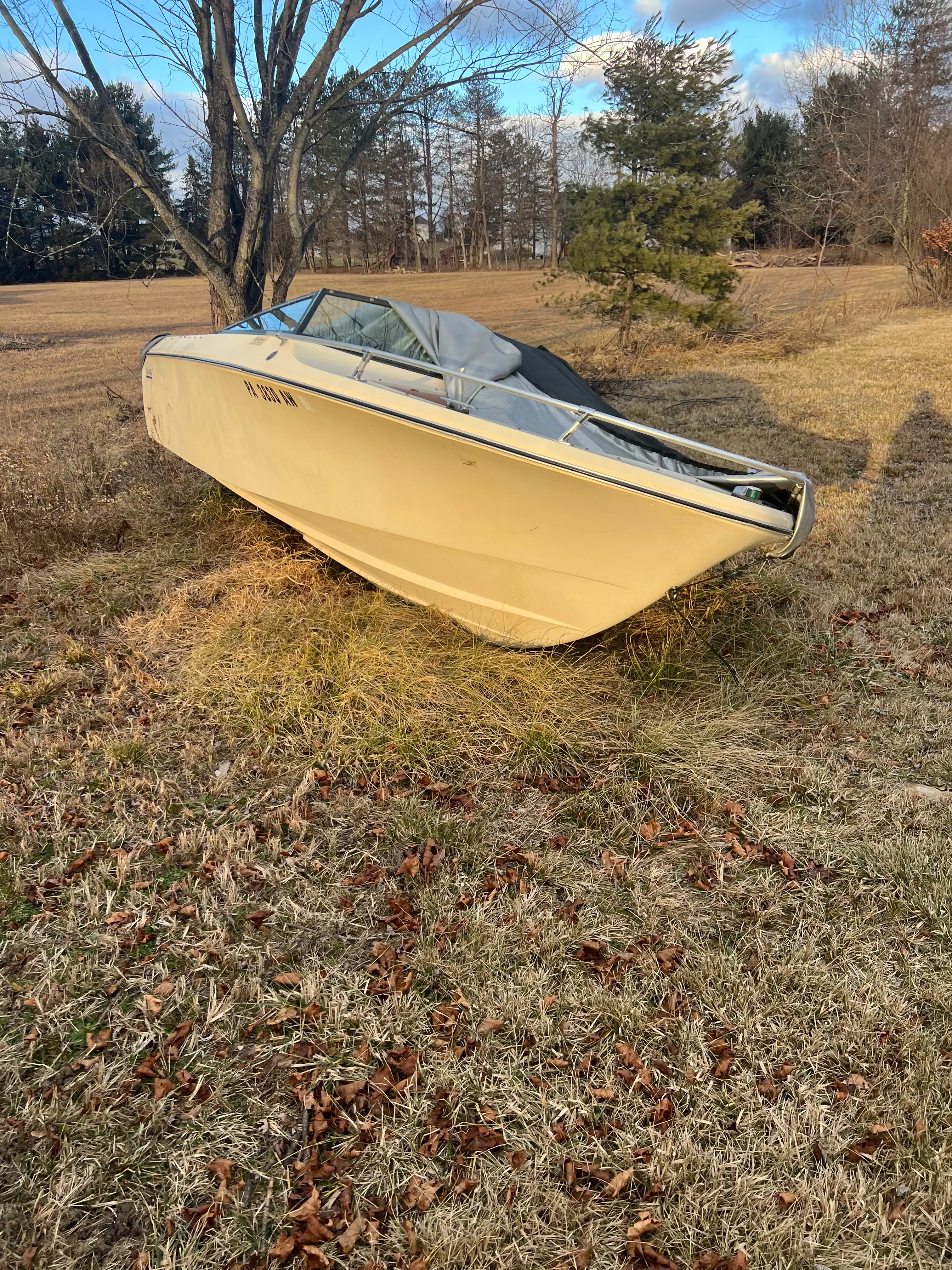 Boat prepared for haul-out with sling setup nearby