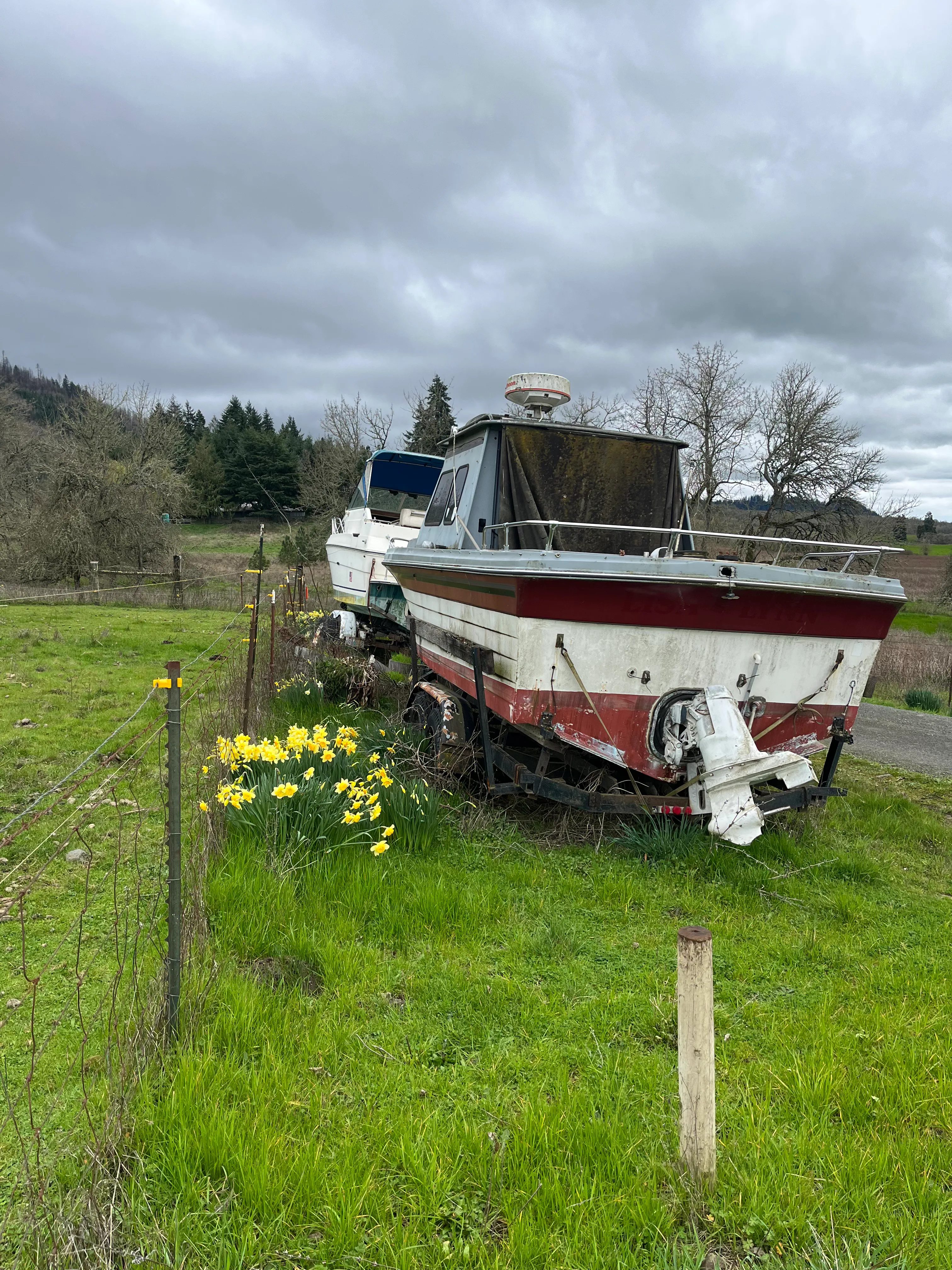 Boat in storage lot photographed for removal planning