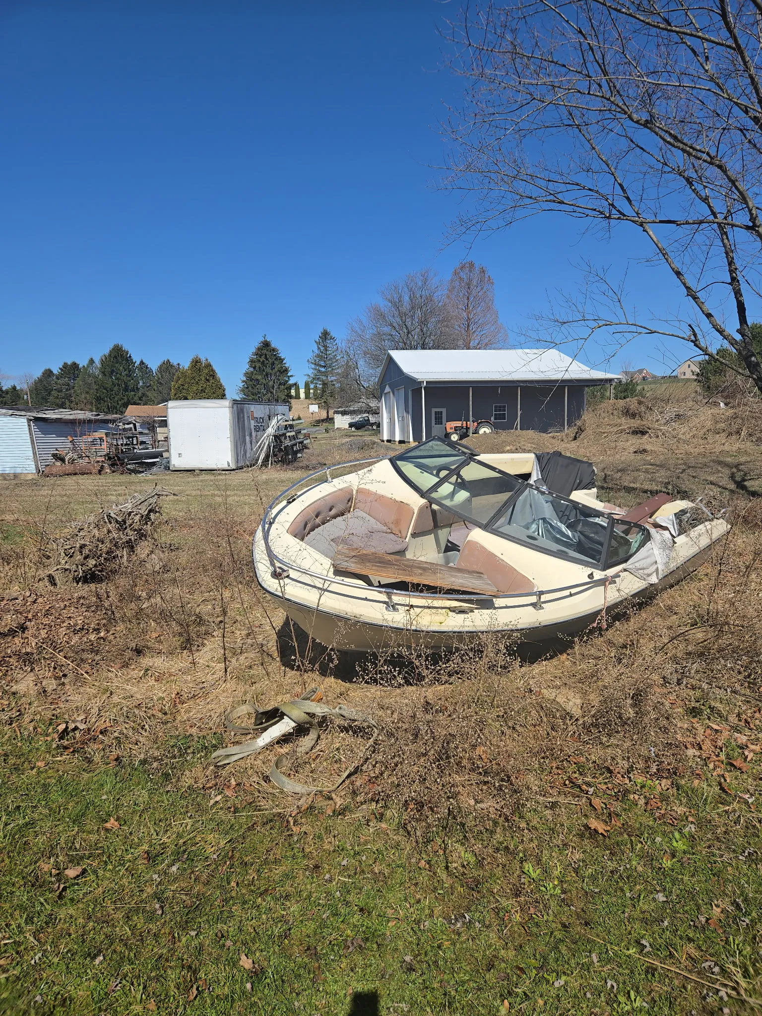 Damaged vessel inspected dockside before towing and removal