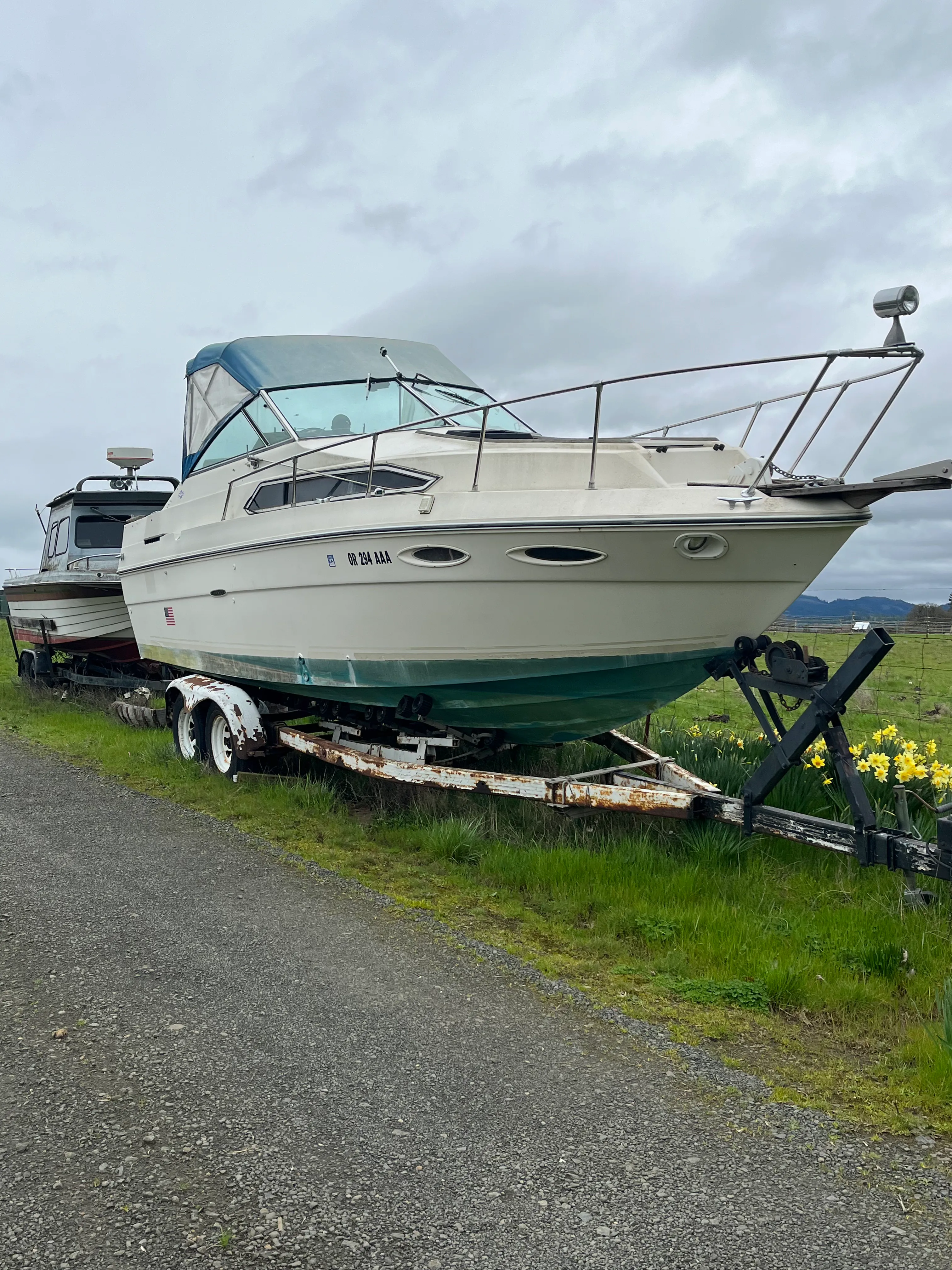 Angled view of a marina boat marked for removal