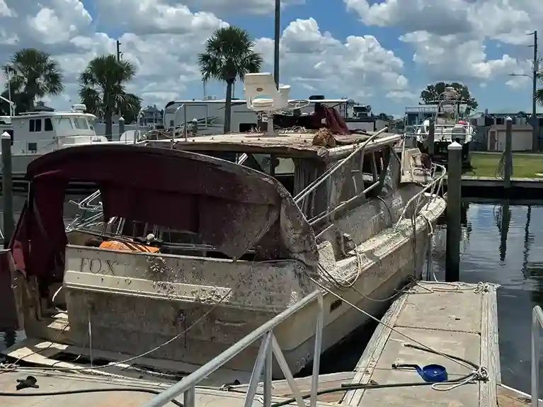 Stern view of a boat parked in land storage before pickup