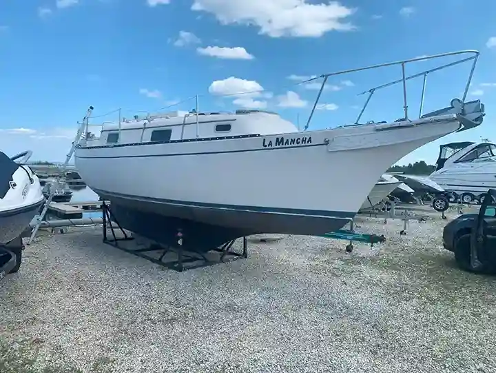 Boat strapped on trailer and ready for transport to disposal site